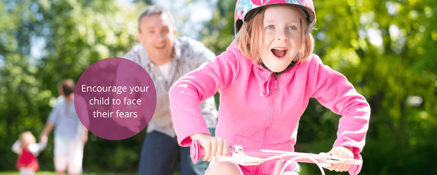 Girl riding bike for the first time